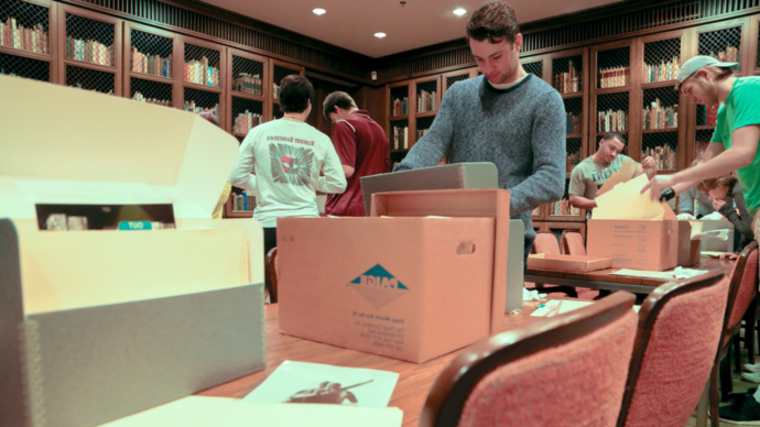 students look through archives in Coates Library's Special Collections and Archives